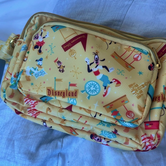 Disney Handbags - Disney Yellow adjustable waist or shoulder strap with Playful Design